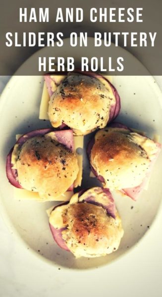 HAM AND CHEESE SLIDERS ON BUTTERY HERB ROLLS