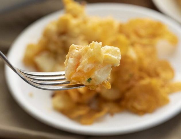 Creamy and cheesy potato casserole with corn flakes