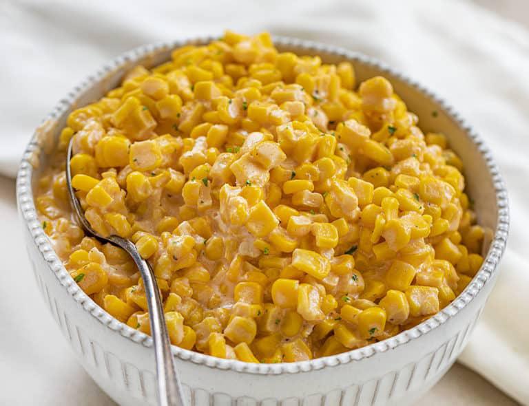 Creamy and Cheesy Crockpot Corn - TASTYDONE