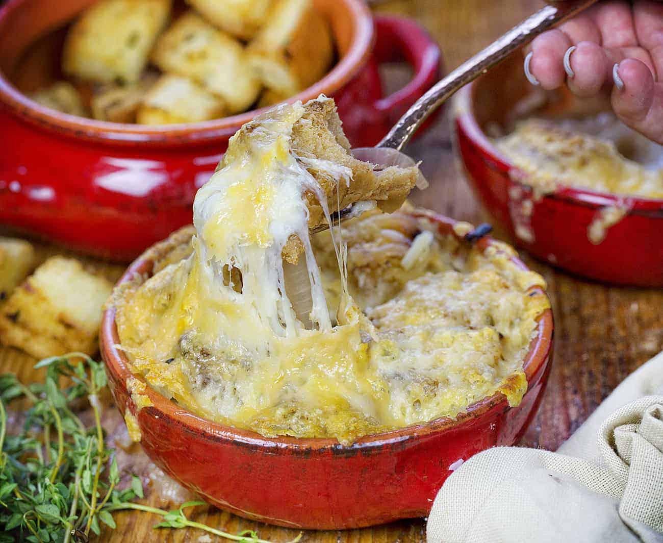 Perfect French Onion Soup Covered in Croutons and Melted Cheese
