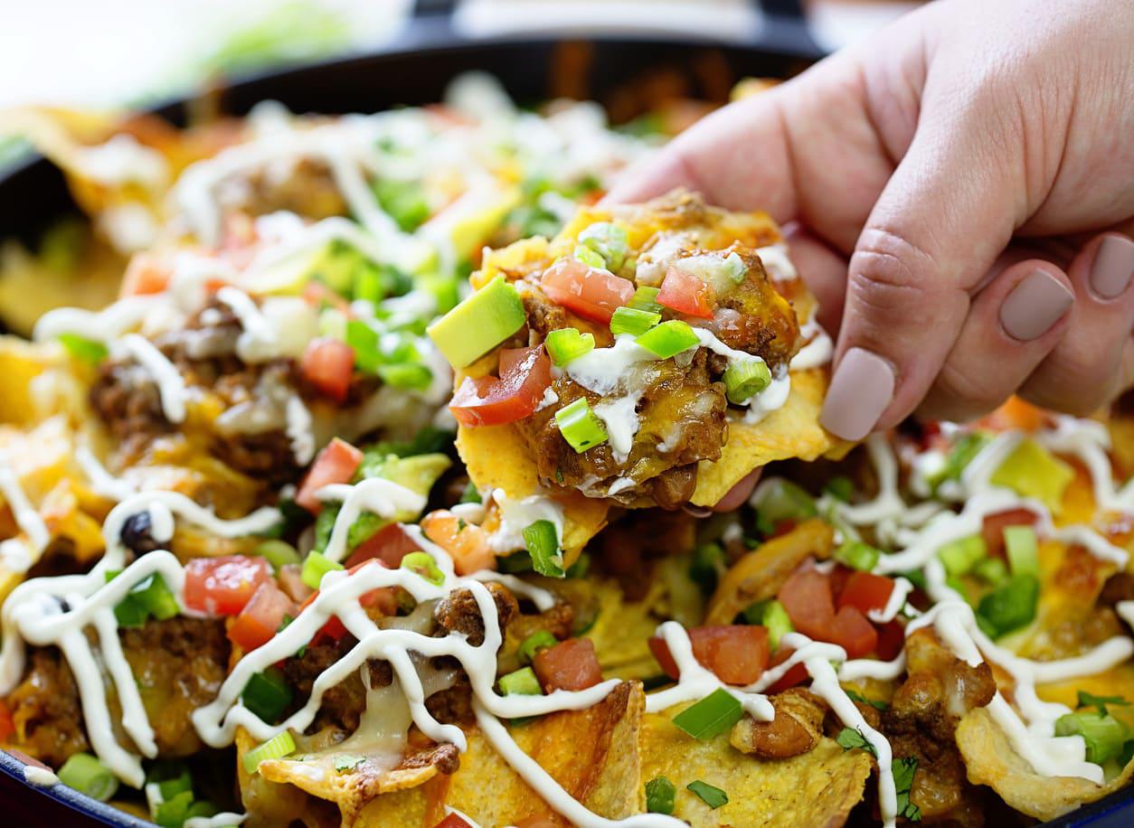 Skillet Beef Nachos with Gooey Cheese and Loads of Fresh Veggies