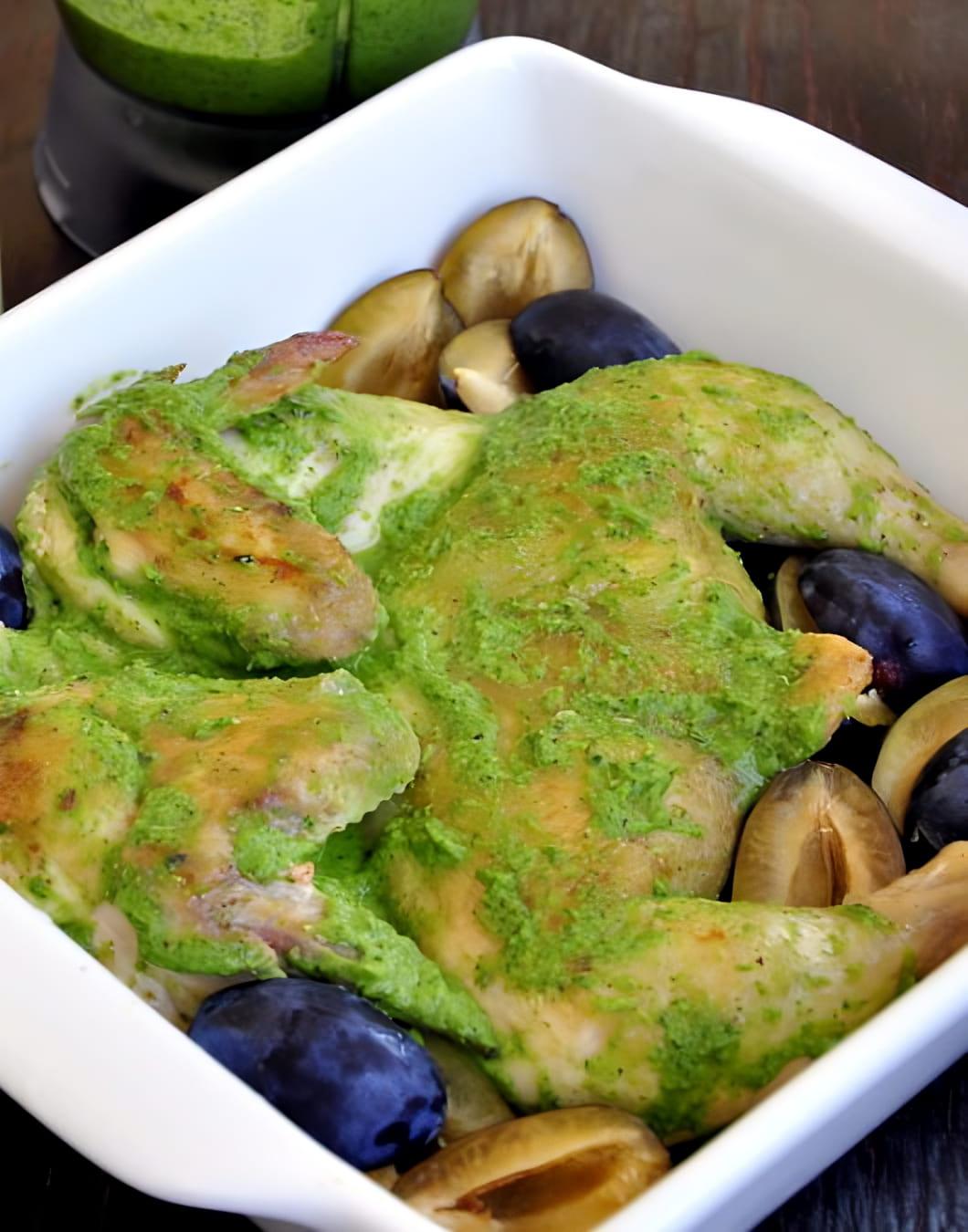 Chicken baked in aromatic green sauce with plums