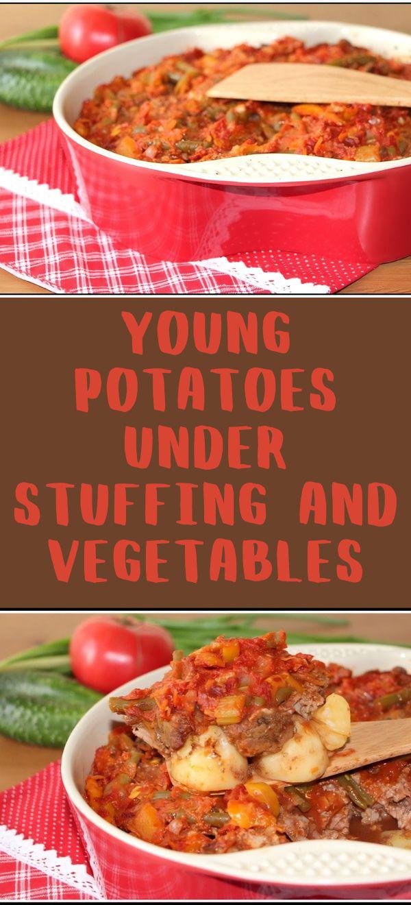 Young potatoes under stuffing and vegetables